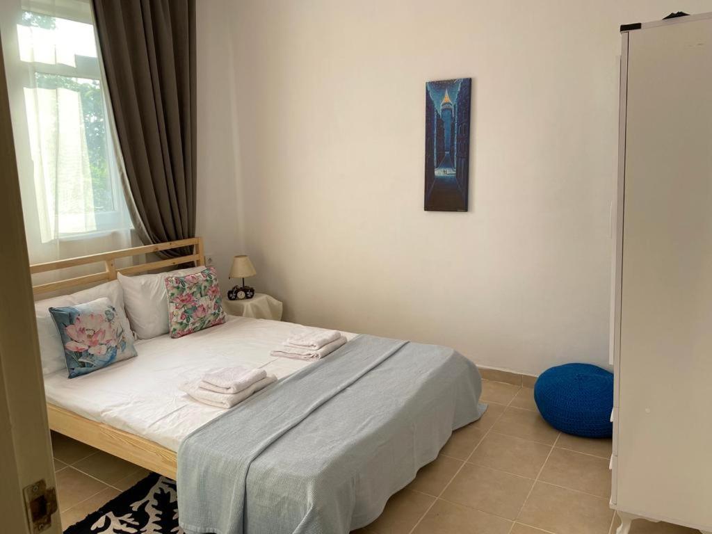 Postel nebo postele na pokoji v ubytování Imroz Kite Pansiyon& Guest House