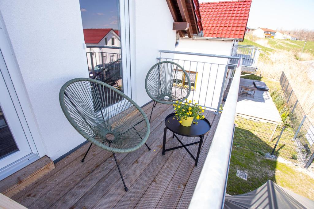 Balkón nebo terasa v ubytování Geiseltalsee Haus am See mit Wallbox