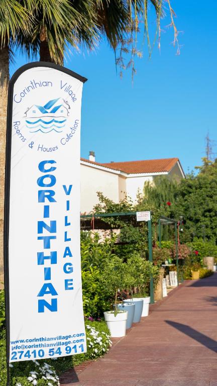 Certifikát, hodnocení, plakát nebo jiný dokument vystavený v ubytování Corinthian Village