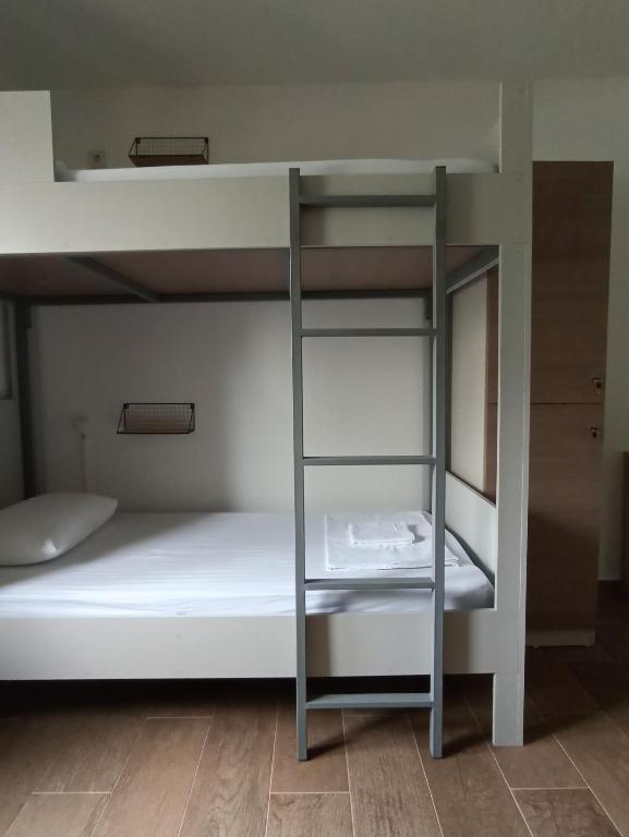 Postel nebo postele na pokoji v ubytování Hostel Hangout