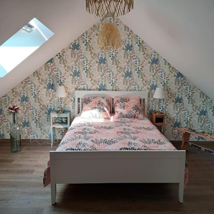 Postel nebo postele na pokoji v ubytování L'Atelier Gîte-Loft 6/8 pers