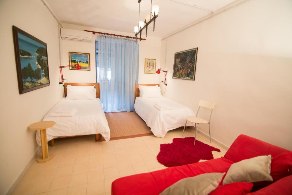 Postel nebo postele na pokoji v ubytování B&B Artistic Tirana