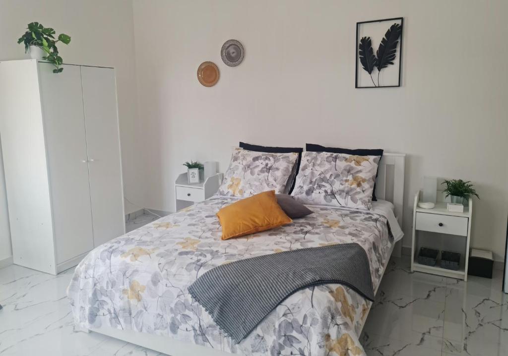 Postel nebo postele na pokoji v ubytování Deluxe B&B "Casa Alegria", Tarrafal