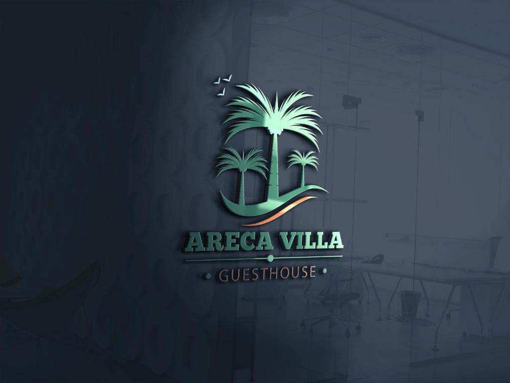 新堡的住宿－Arecavilla guesthouse，蓝底上的棕榈树标志