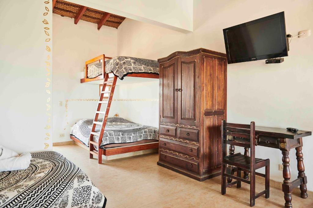 Postel nebo postele na pokoji v ubytování Buena Vista Lobitos