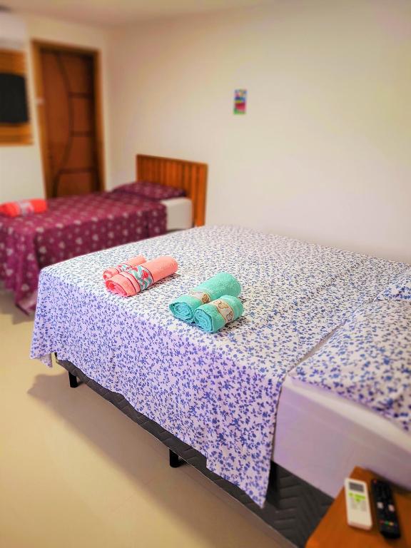 Voodi või voodid majutusasutuse Praieira Hostel&Pousada toas