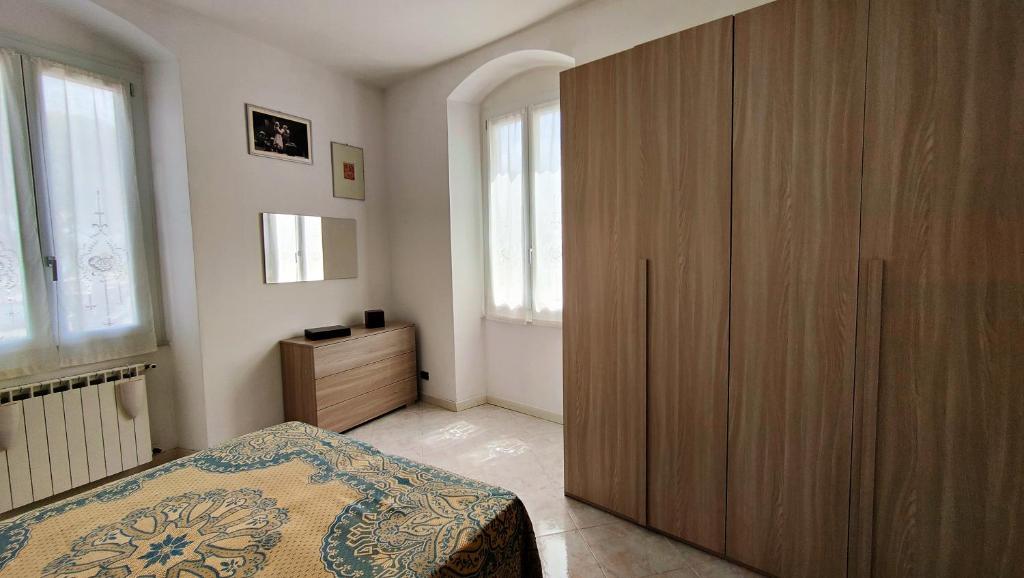 Postel nebo postele na pokoji v ubytování UN BALCONE IN PINETA