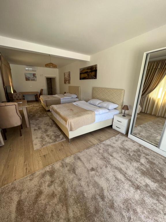 Postel nebo postele na pokoji v ubytování Bali Mountain resort Montenegro