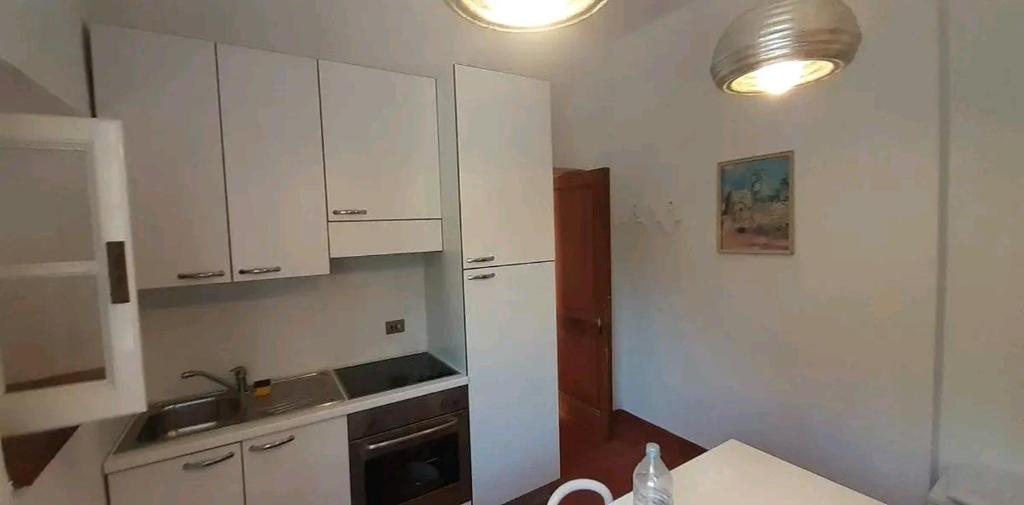 A kitchen or kitchenette at Appartamento località le Cannelle