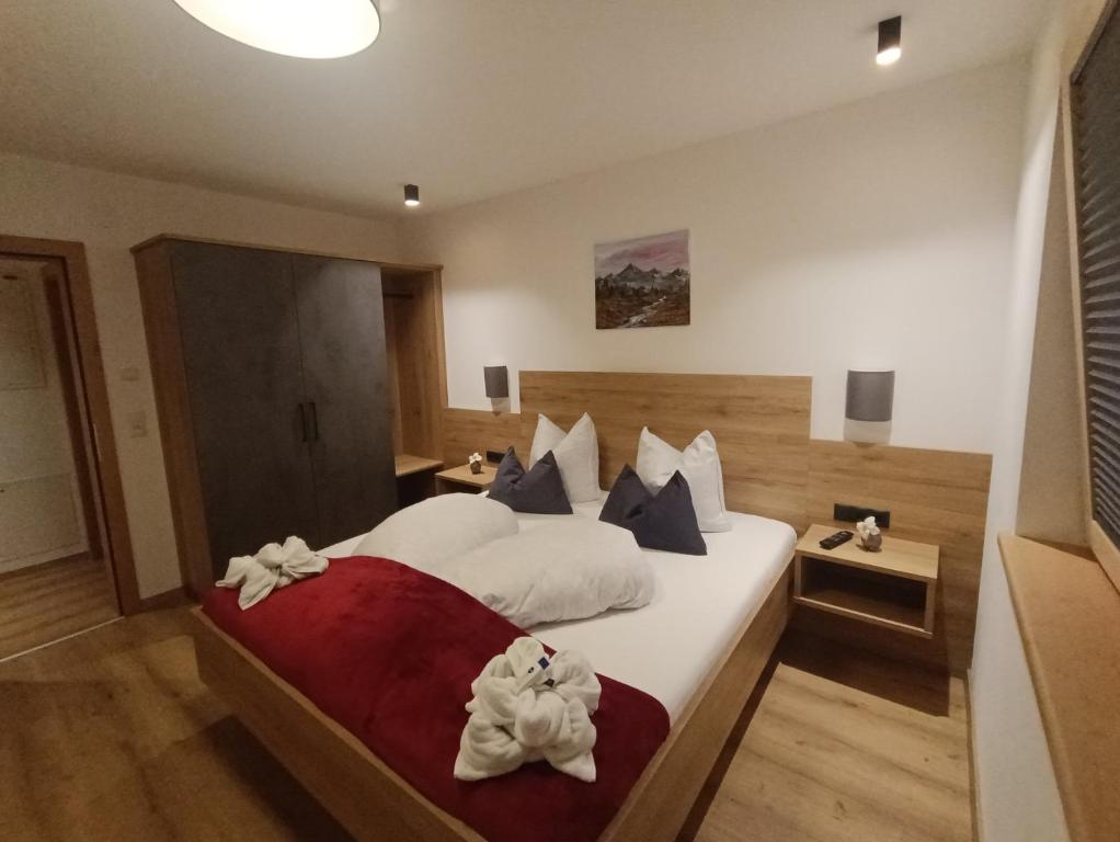 Postel nebo postele na pokoji v ubytování Alpenoase