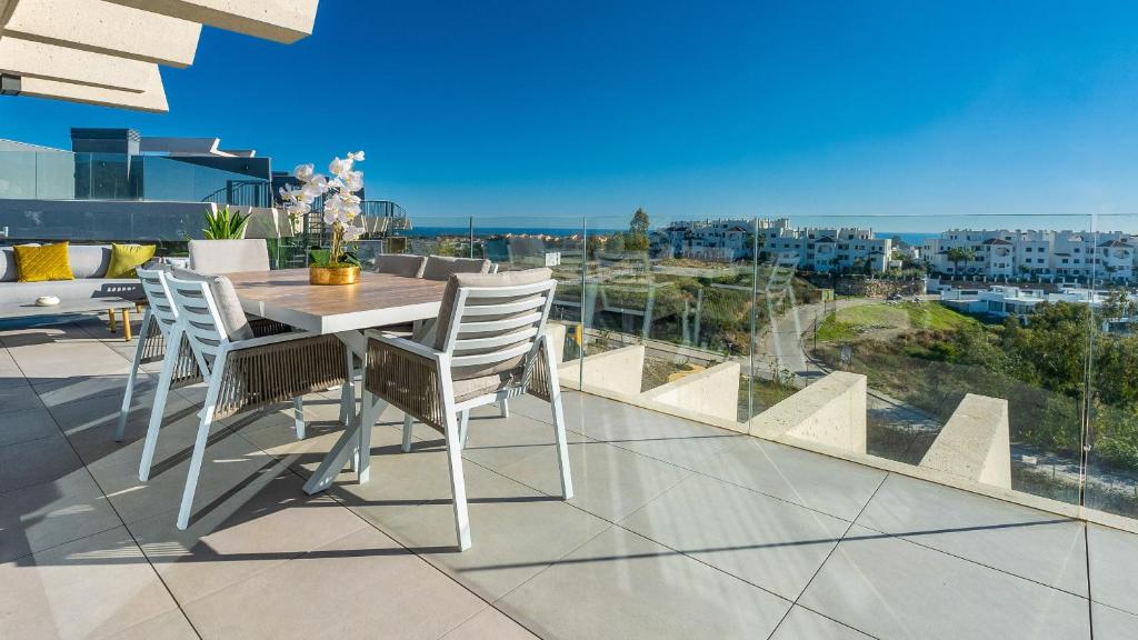 Image showcasing Oasis 325 penthouse, Estepona (updated prices 2026)
