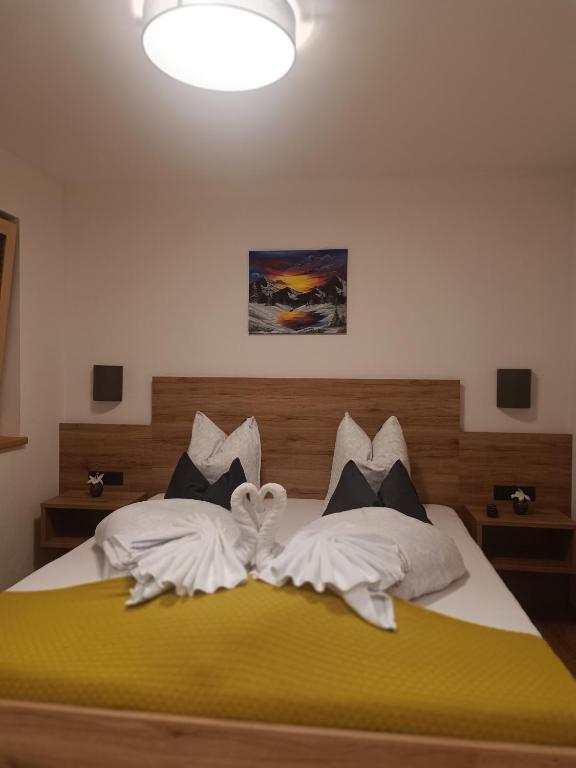 Postel nebo postele na pokoji v ubytování Alpenoase