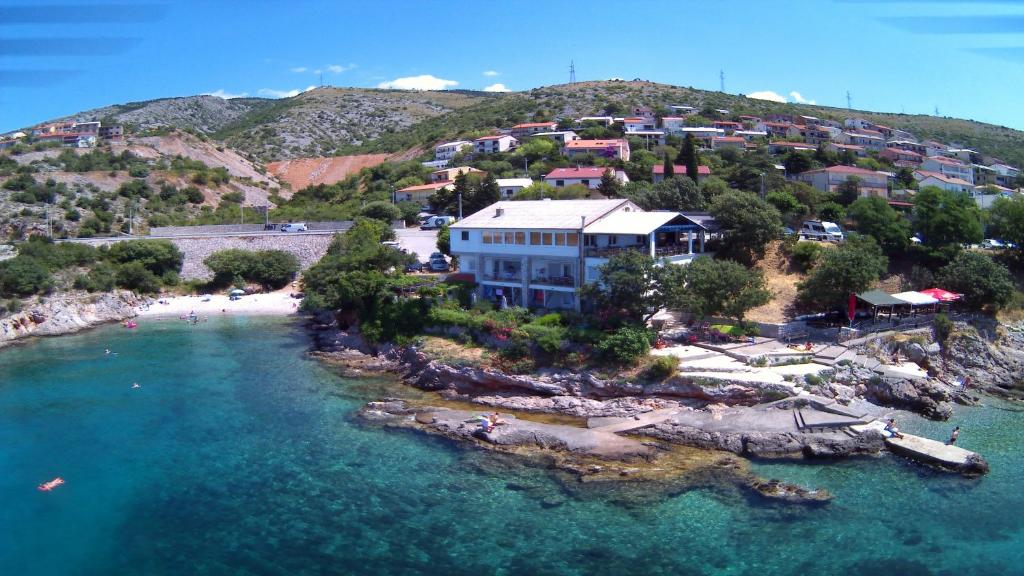 an aerial view of a small island in the water at Apartman i sobe Martina in Senj