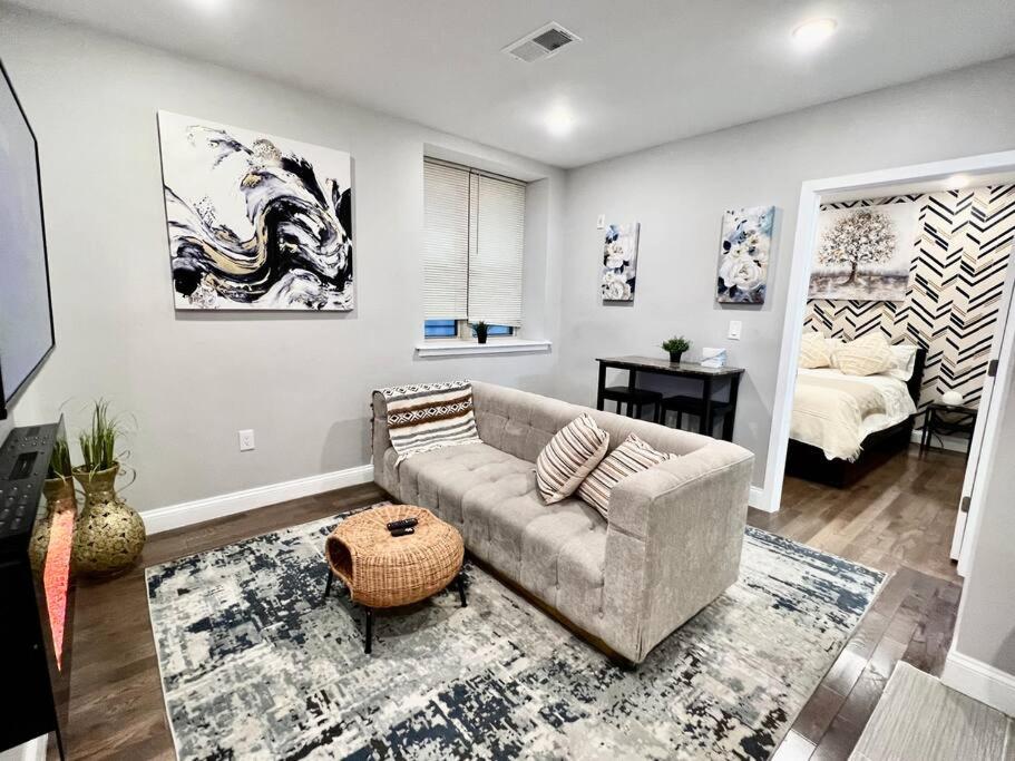 a living room with a couch and a table at 305 Cozy and lovely 1BDR apartment in Center City in Philadelphia