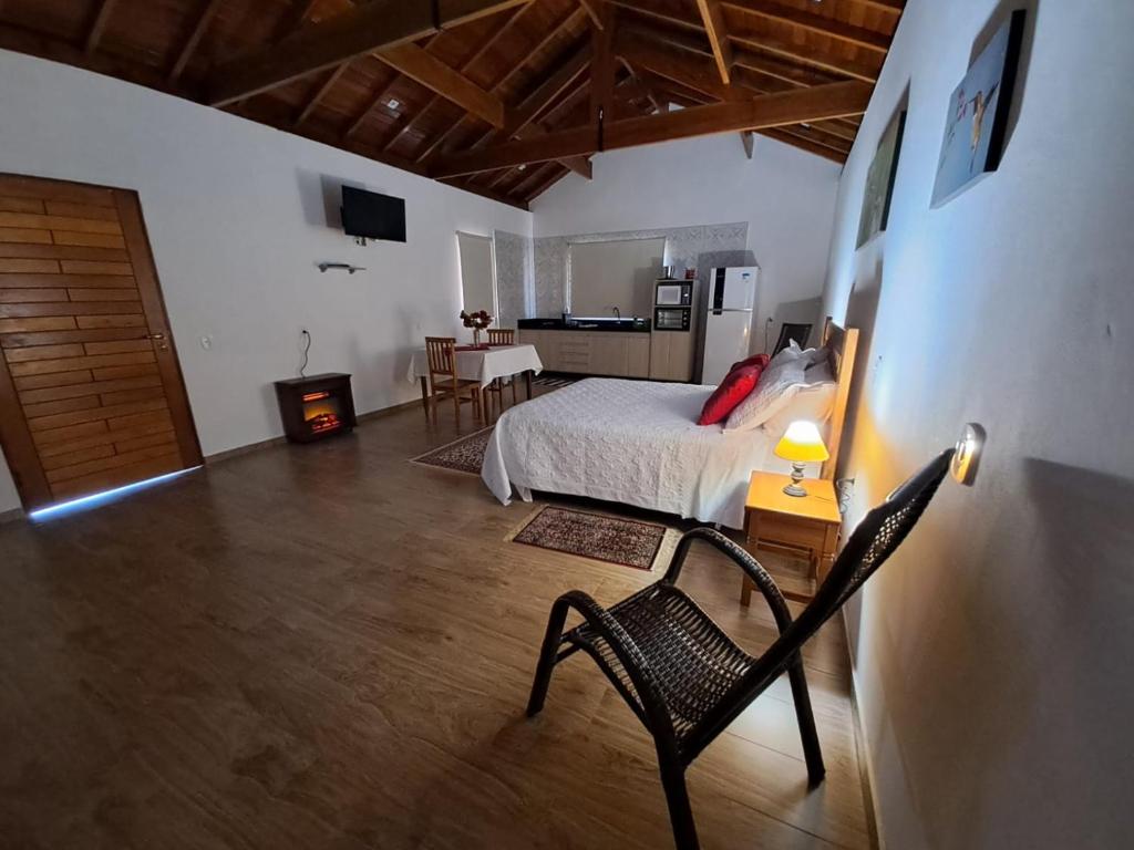 Postel nebo postele na pokoji v ubytování Chalés Conforto Mineiro