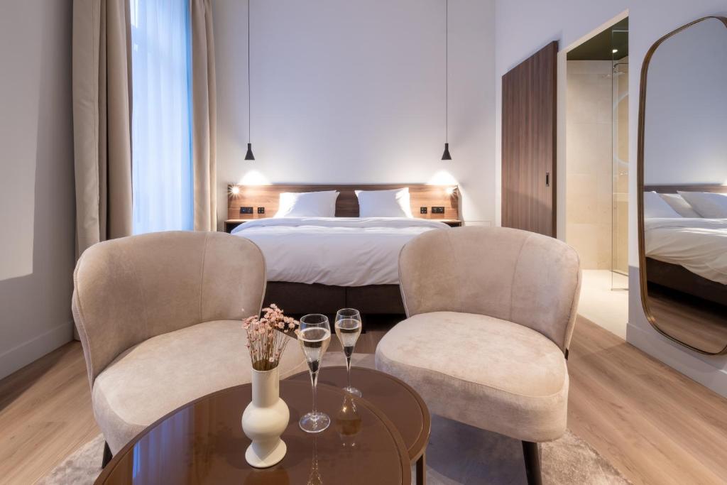 Postel nebo postele na pokoji v ubytování ONE TWO FOUR - Hotel & Spa