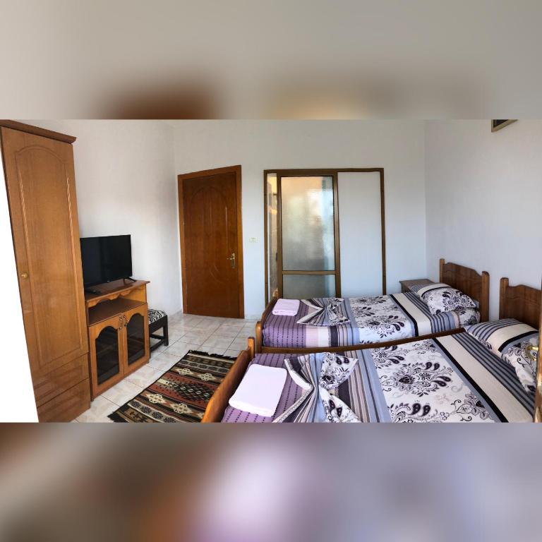 Postel nebo postele na pokoji v ubytování Camping & Guest House Herges
