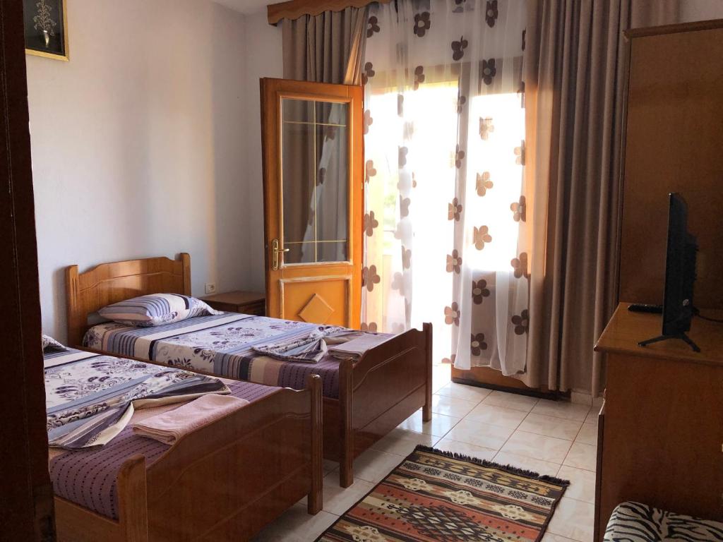 Postel nebo postele na pokoji v ubytování Camping & Guest House Herges