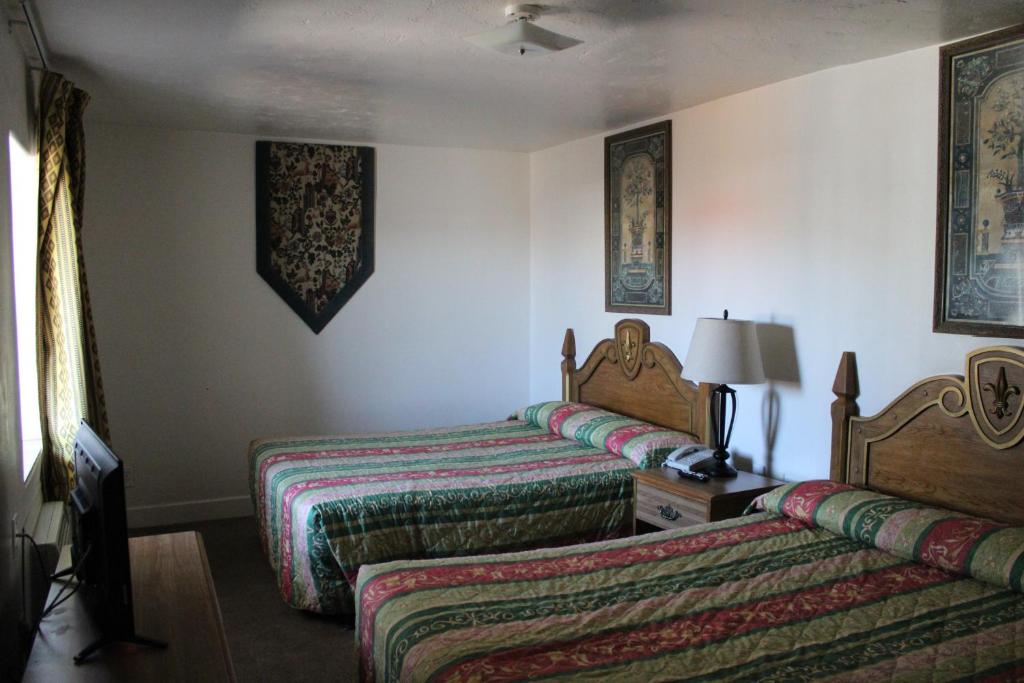 Voodi või voodid majutusasutuse Flagstaff Motel toas