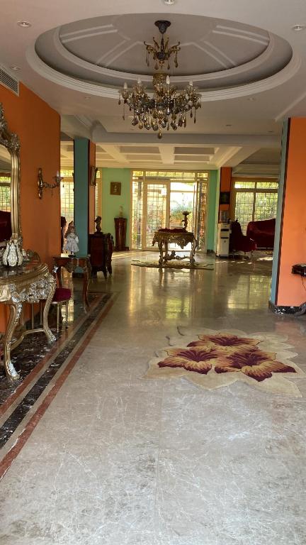 a large room with a large rug on the floor at الرحاب 2 in Cairo