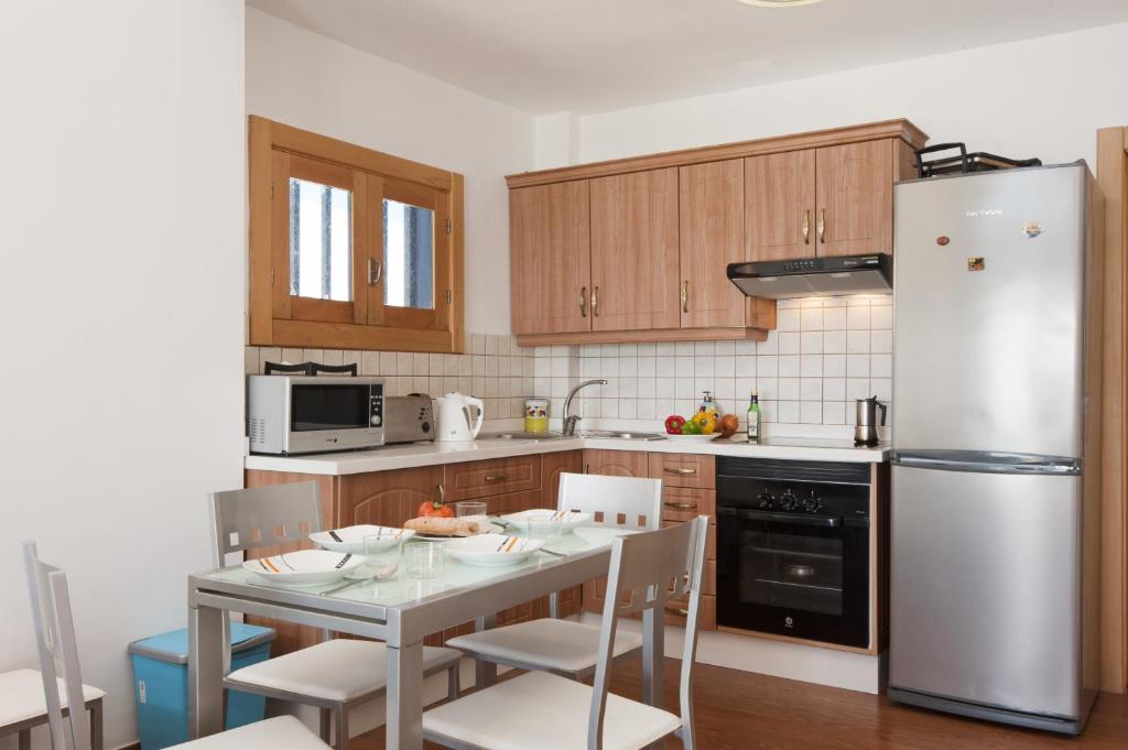Kuchyň nebo kuchyňský kout v ubytování Casita Lanzaocean view