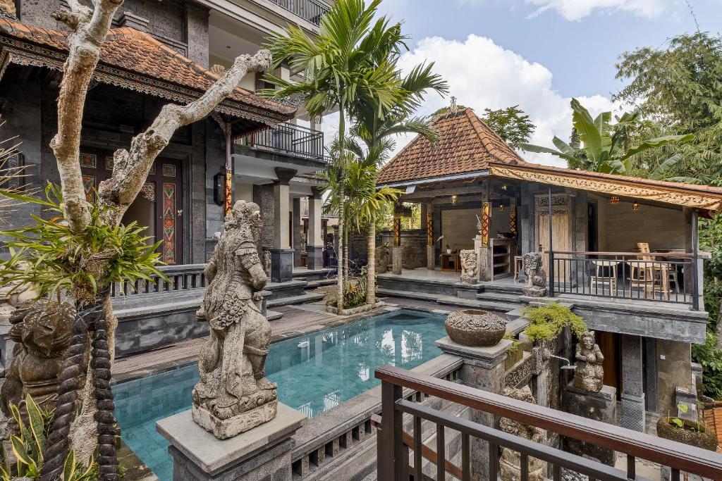 Bazén v ubytování Tigata Ubud Cottage nebo v jeho okolí