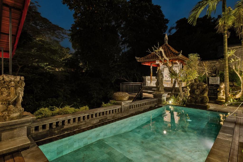 Bazén v ubytování Tigata Ubud Cottage nebo v jeho okolí