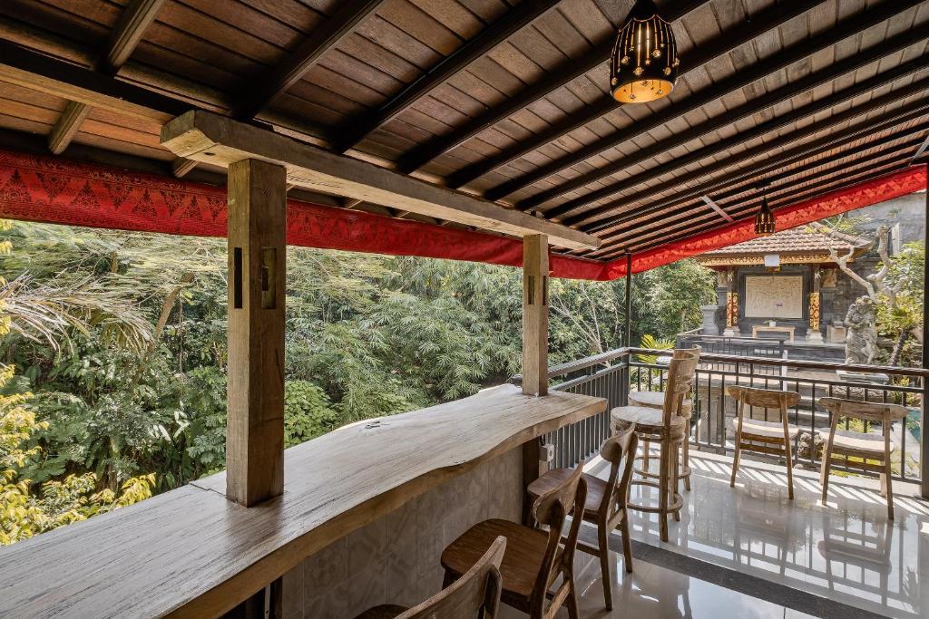 Balkón nebo terasa v ubytování Tigata Ubud Cottage