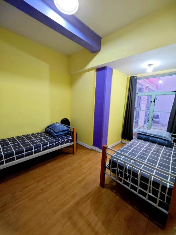 Postel nebo postele na pokoji v ubytování Frienz Backpacker