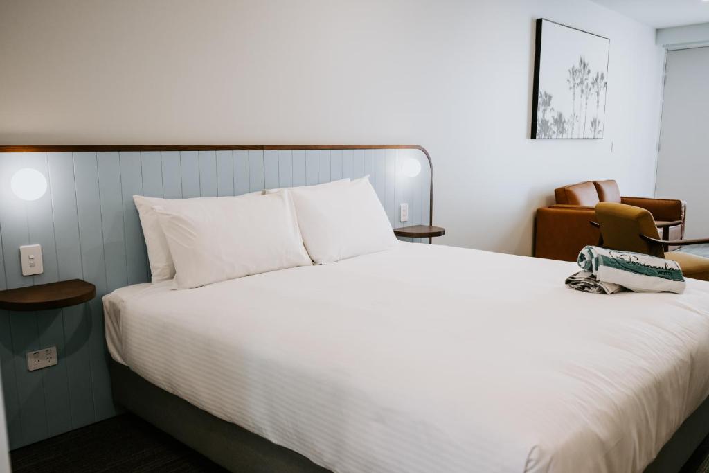 Postel nebo postele na pokoji v ubytování Peninsula Hotel Motel