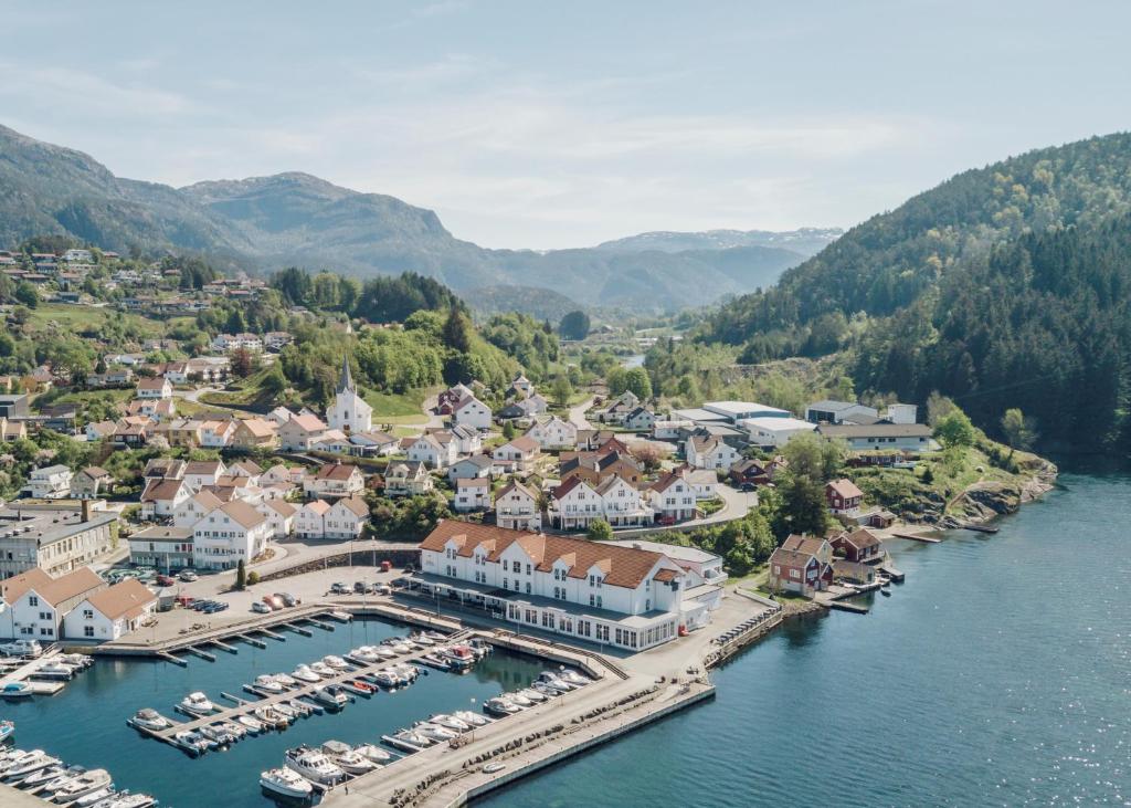 an aerial view of a small town next to a marina at Ryfylke Fjordhotel in Sand