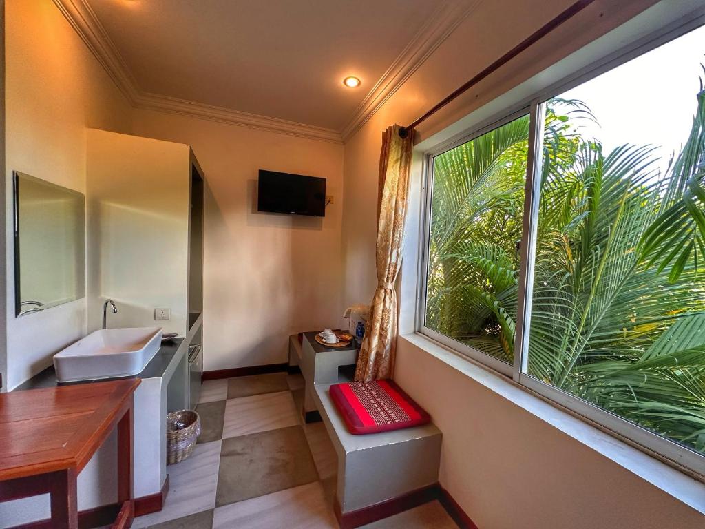 TV a/nebo společenská místnost v ubytování Villa Um Theara, Siem Reap