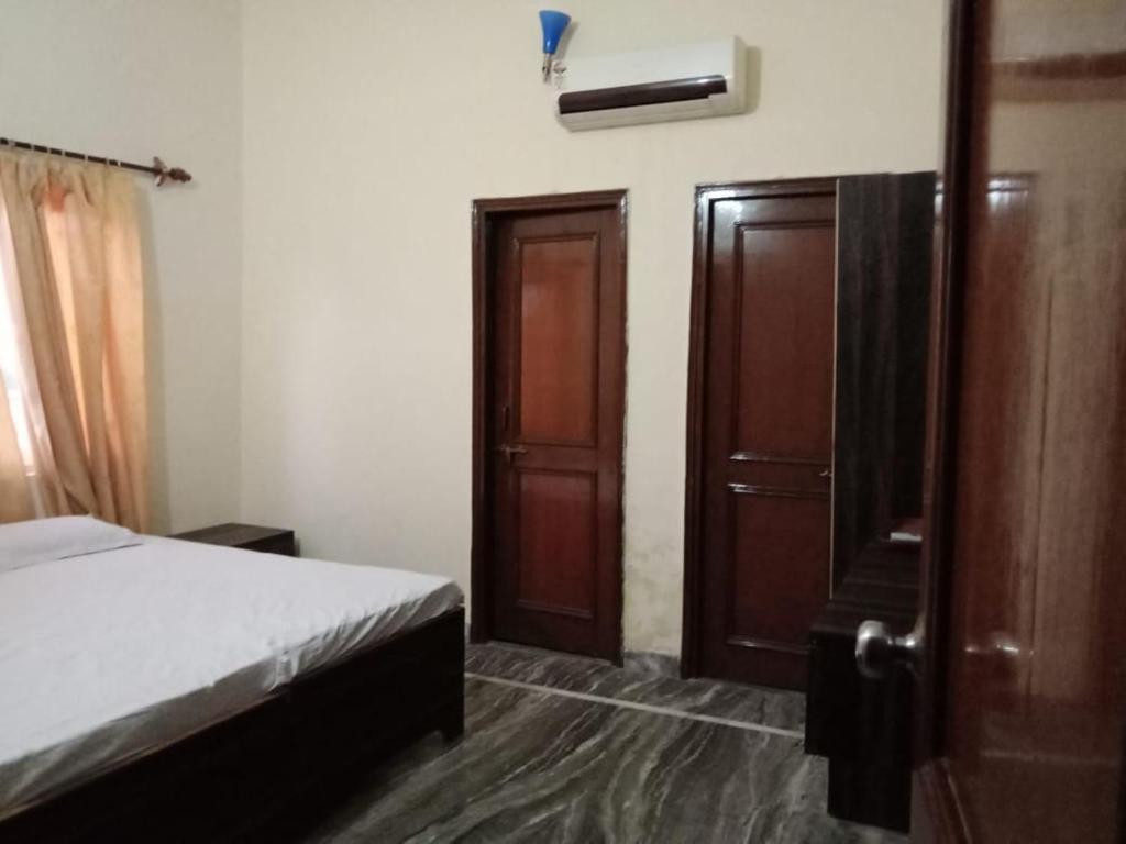 Ammaji - Deluxe Room