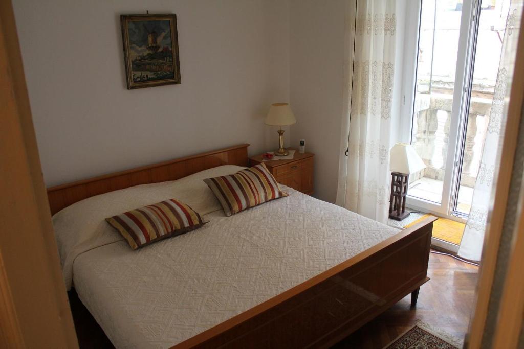 Posteľ alebo postele v izbe v ubytovaní Apartment Dona Vesna