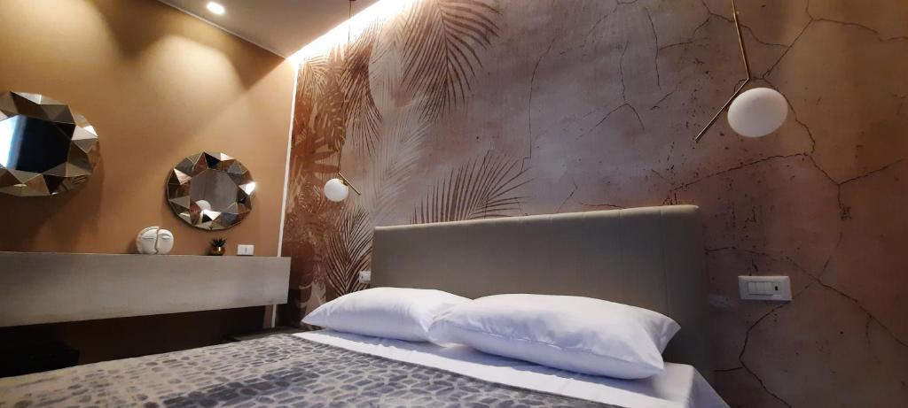 Postel nebo postele na pokoji v ubytování Suite House 5 Terre