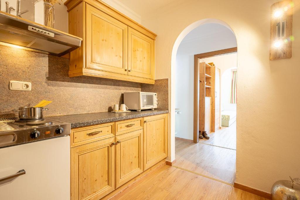 Kuchyň nebo kuchyňský kout v ubytování Hotel Eschenhof & Apartments