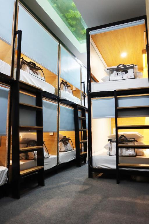 Postel nebo postele na pokoji v ubytování AMANGO HOSTEL