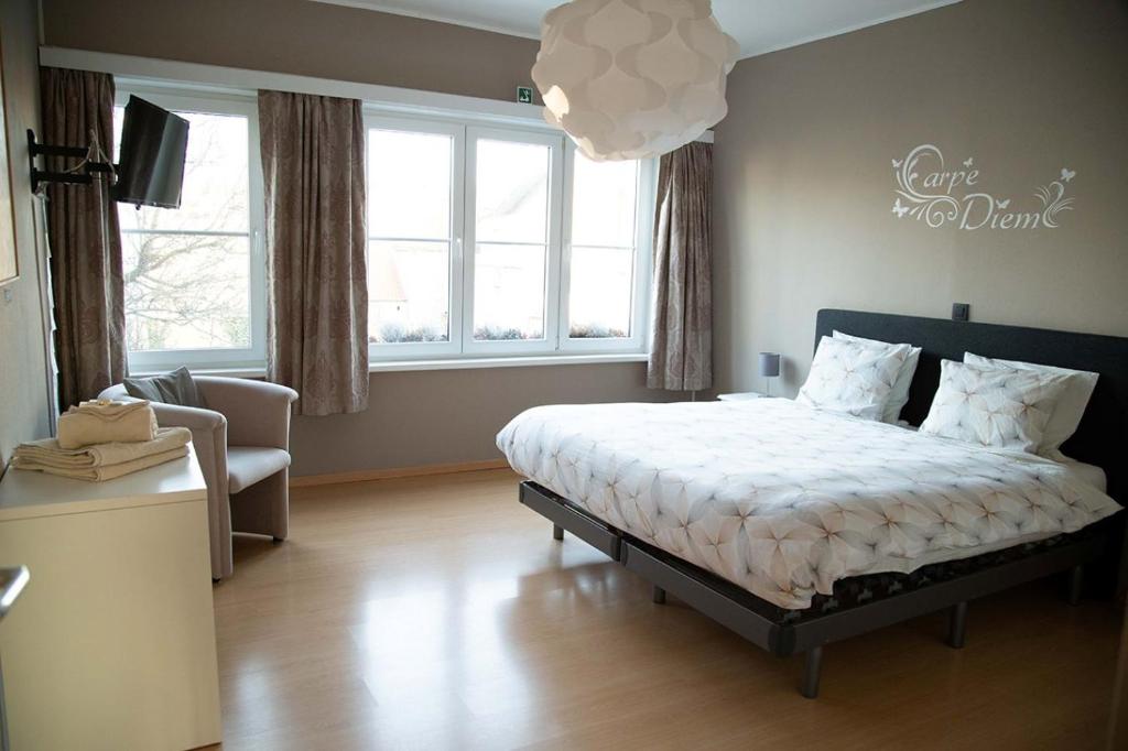 Postel nebo postele na pokoji v ubytování Room "Carpe Diem"