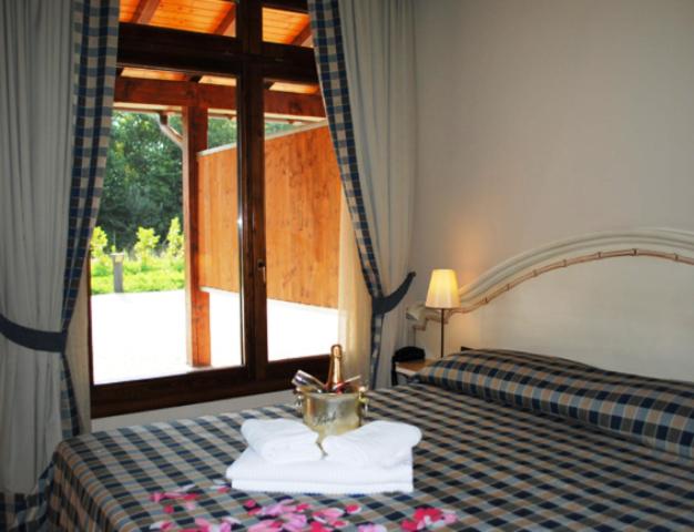 Postel nebo postele na pokoji v ubytování Motel 7 Laghi