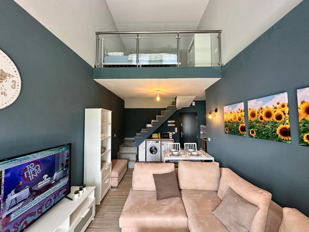 TV a/nebo společenská místnost v ubytování ALF Apartments & Lofts