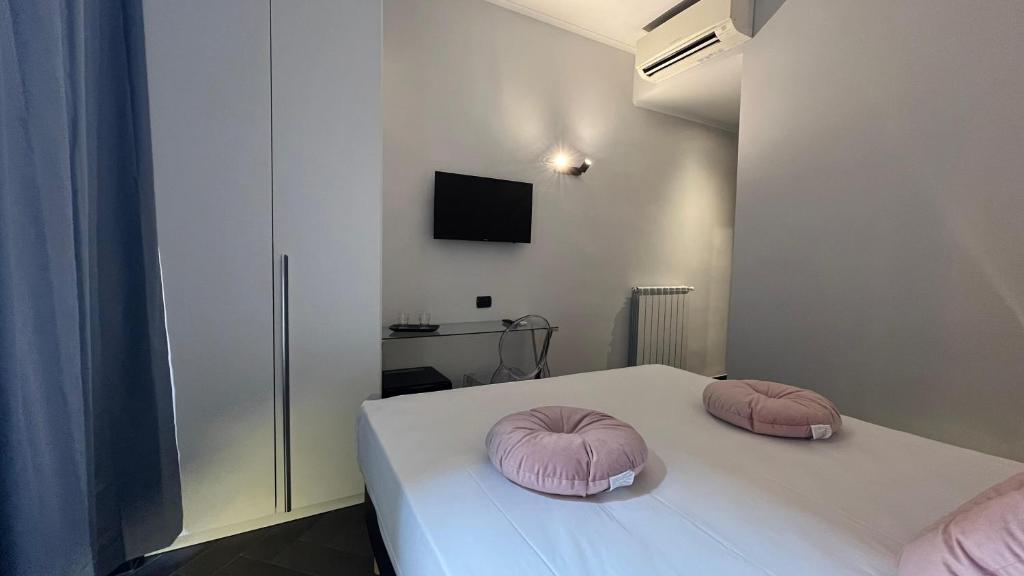 Postel nebo postele na pokoji v ubytování Cloud 9 Hotel