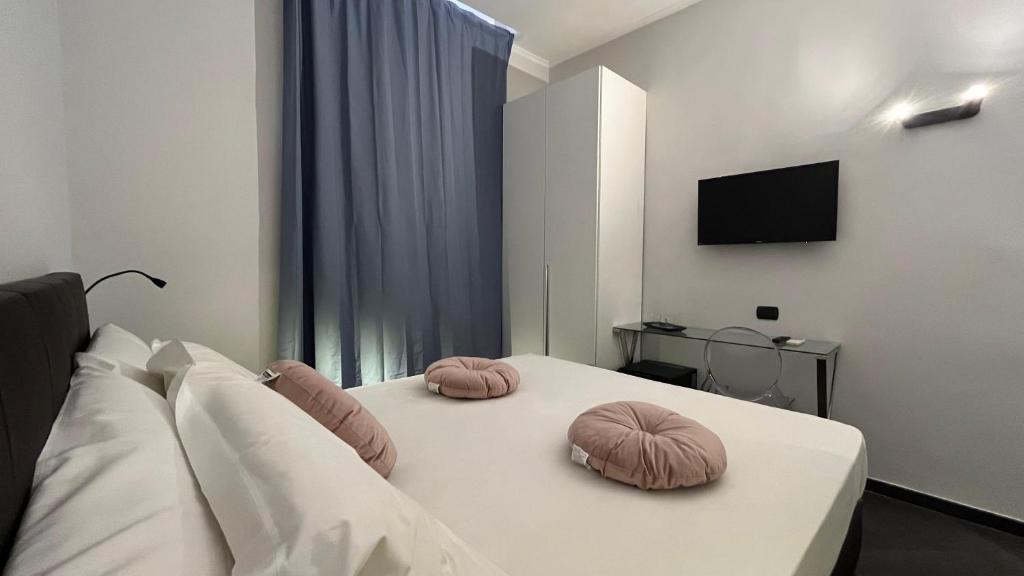 Postel nebo postele na pokoji v ubytování Cloud 9 Hotel