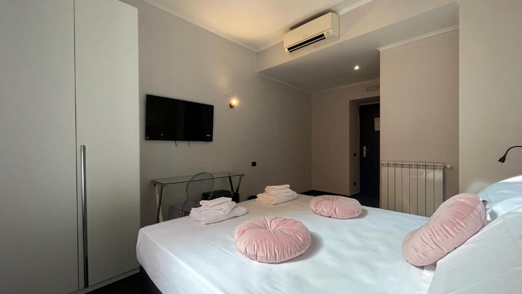 Postel nebo postele na pokoji v ubytování Cloud 9 Hotel
