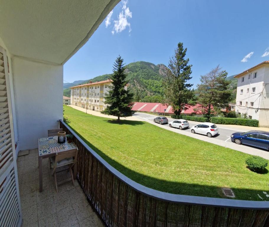 a balcony with a view of a street at Apartamento CREMALLERA Ribes de Freser in Ribes de Freser