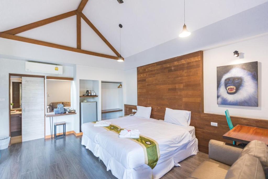 Ein Bett oder Betten in einem Zimmer der Unterkunft IP Plus Pool Villa Pattaya