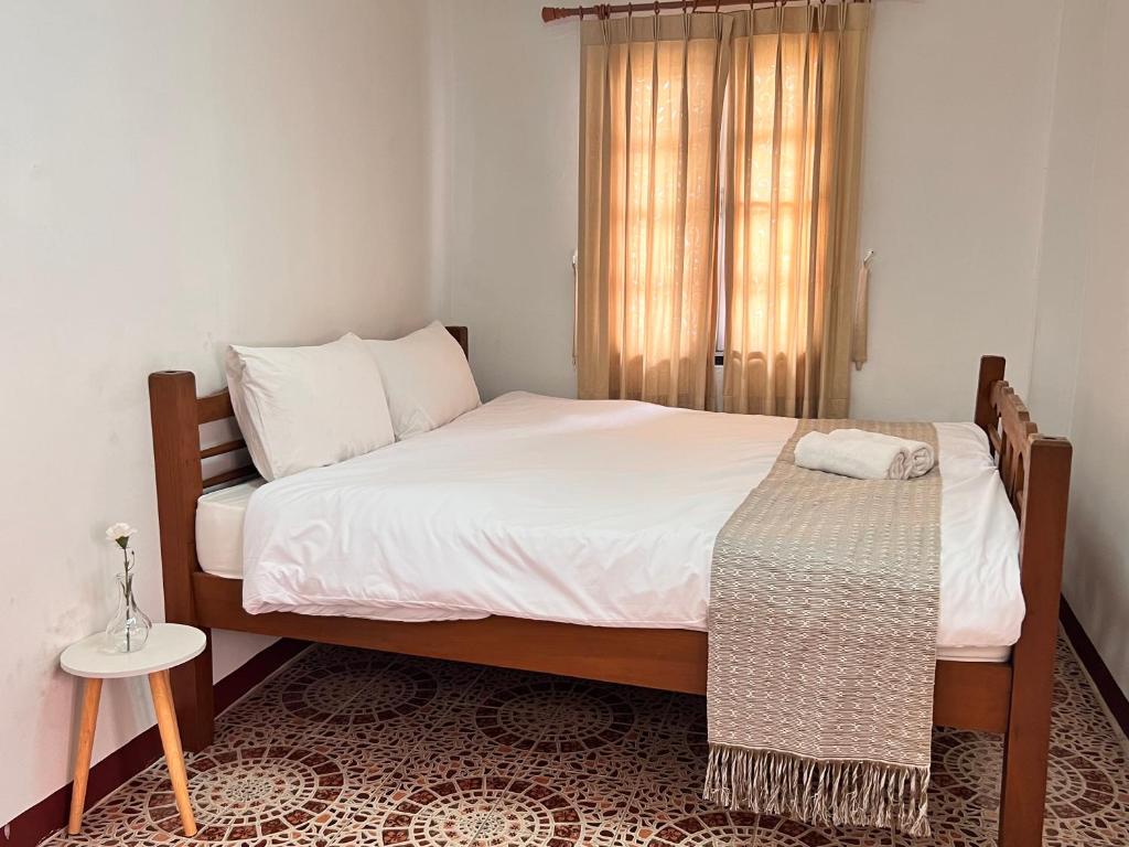 บ้านไทยไออุ่น - Chambre Quadruple Avec Balcon