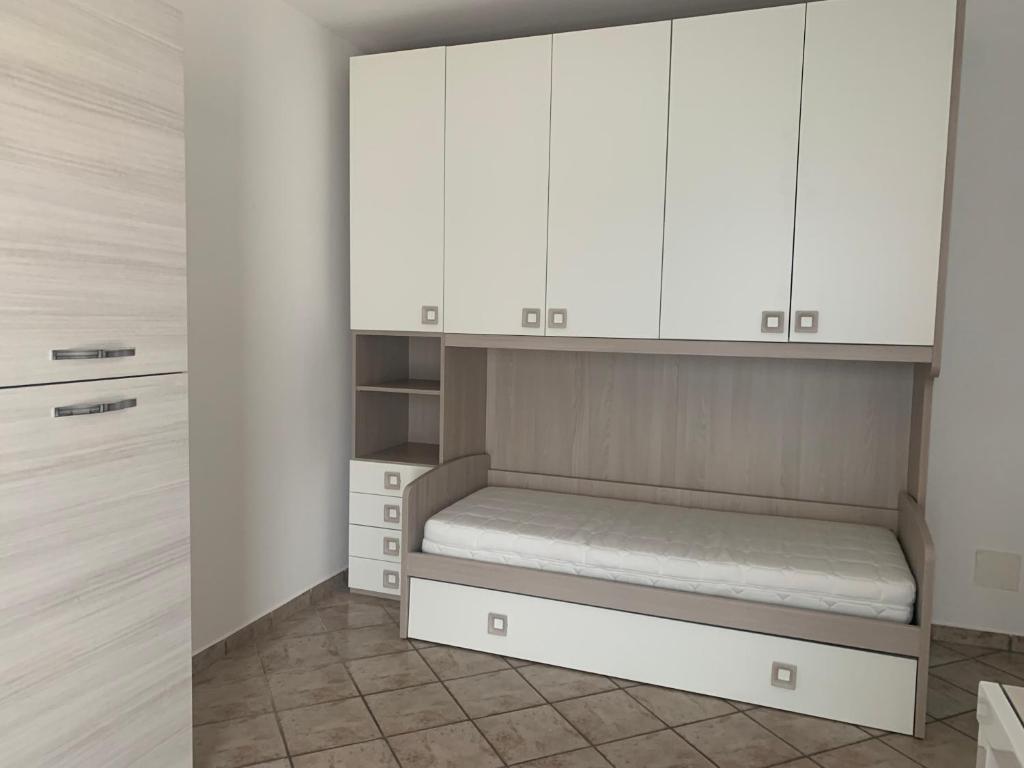 Kuchyň nebo kuchyňský kout v ubytování Il Cortiletto