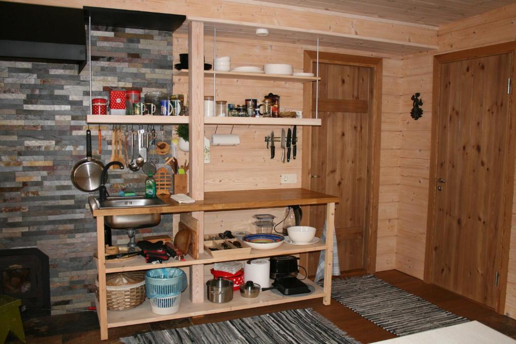 Kuchyň nebo kuchyňský kout v ubytování Natura Sauna