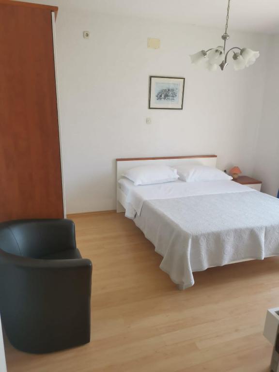 Postel nebo postele na pokoji v ubytování Apartment Nada