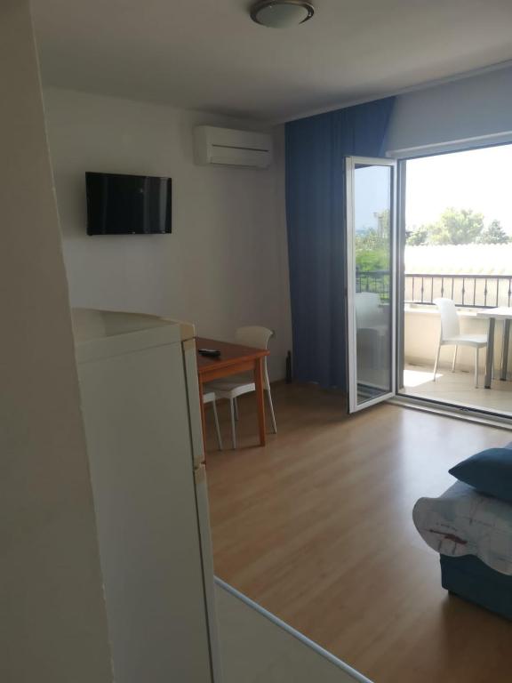 TV a/nebo společenská místnost v ubytování Apartment Nada